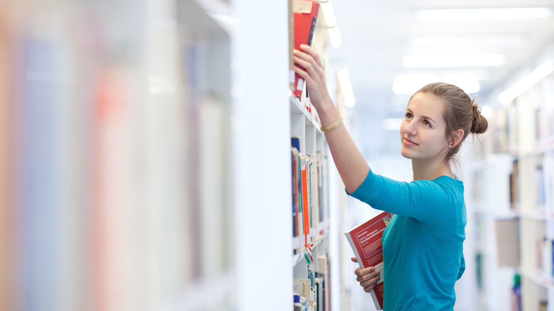 Librarian Stocking Books