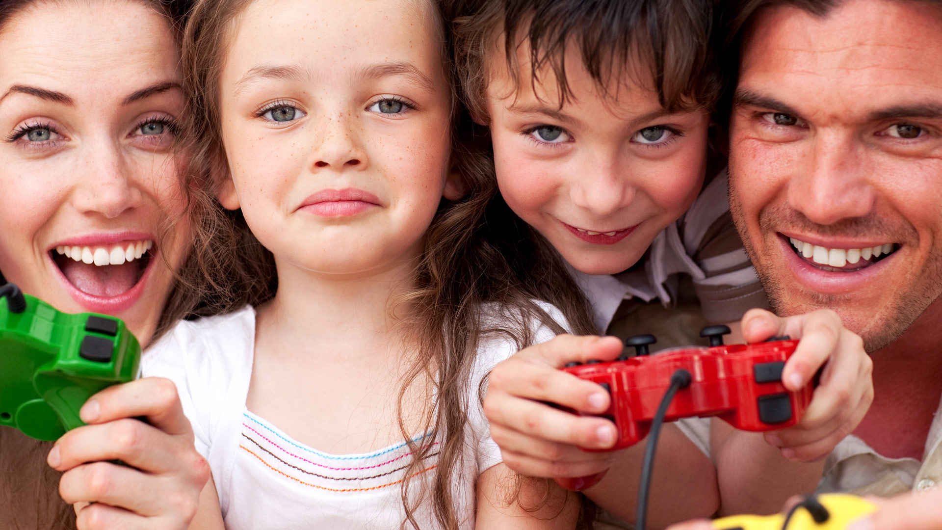 Close-up of Family with Controllers